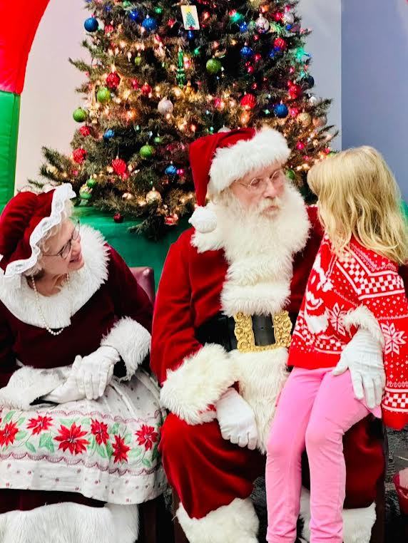 Santa John and Mrs. Claus with families, photo 13 of 21